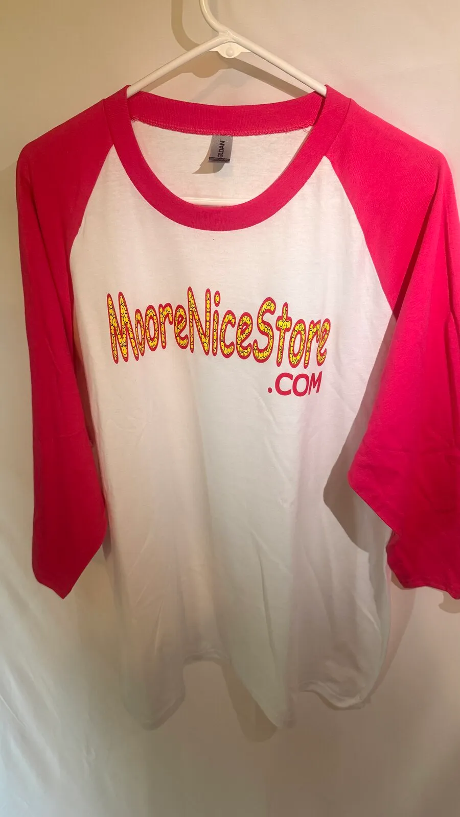 "MooreNiceStore.com" raglan T-shirt design, pink sleeves